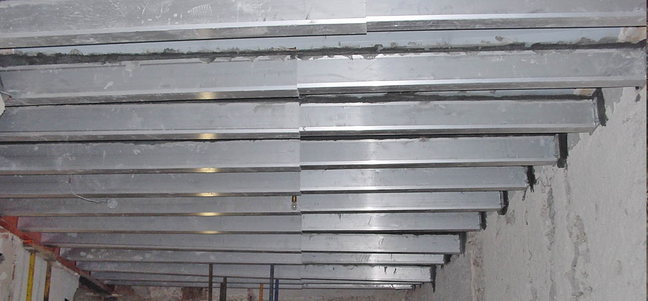 Solución de refuerzo estructural con vigas EXTEND-SYSTEM de tres tramos
